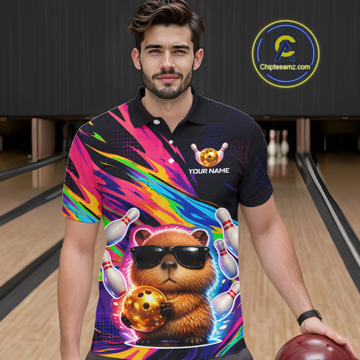 Man wearing a colorful polo shirt with a Funny capybara design in a bowling alley.