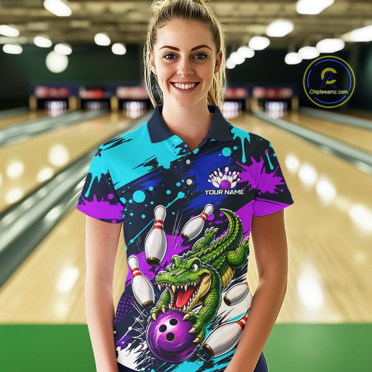 Woman wearing a colorful bowling shirt with a dragon design in a bowling alley.