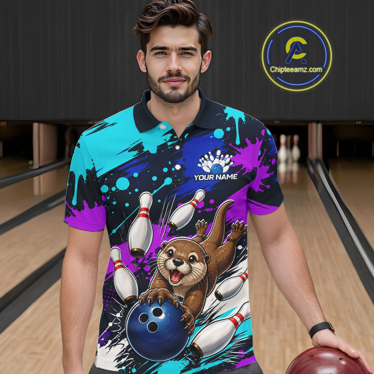 Man wearing a colorful bowling-themed shirt with an otter character in a bowling alley.