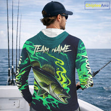 Load image into Gallery viewer, Angler wearing custom Walleye fishing green camo long sleeve hooded shirt on the boat - back view with team name on the back