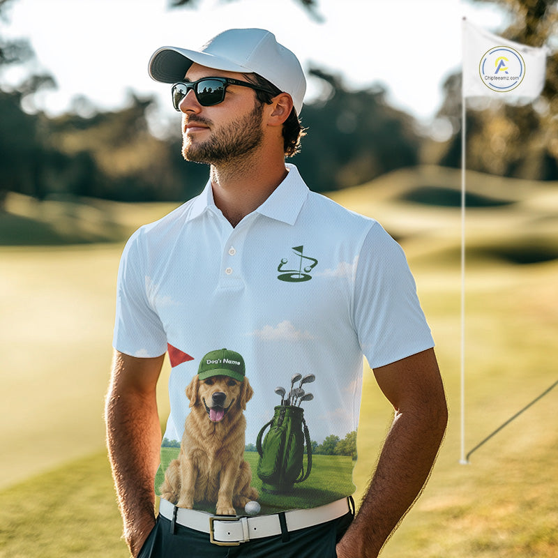 Man on a golf course wearing a white polo shirt with a dog and golfing equipment design.