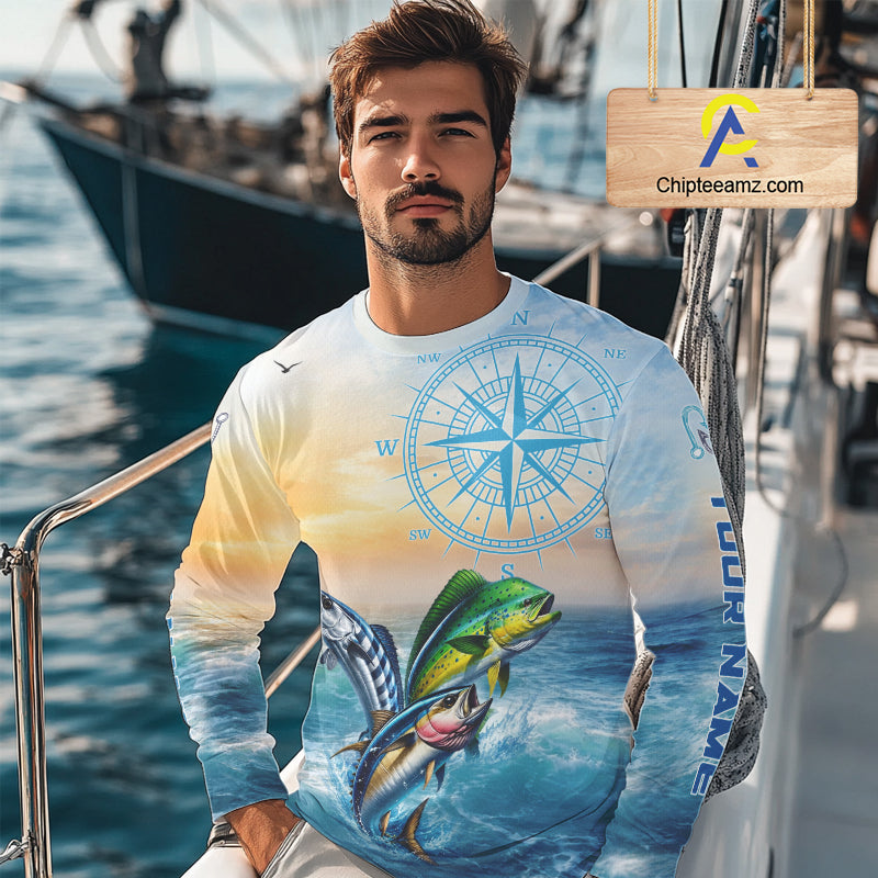 Angler wearing mahi mahi wahoo tuna blue performance fishing shirt on boat with custom name on sleeves