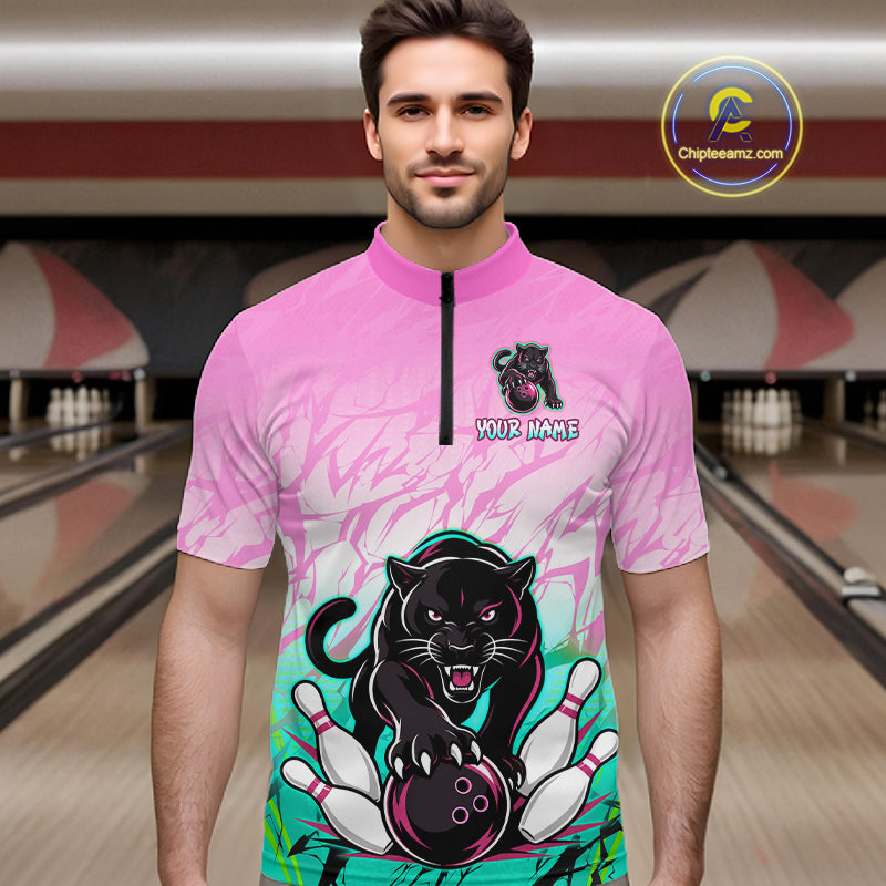 Bowler wearing custom pink and turquoise leopard bowling shirt on the lanes
