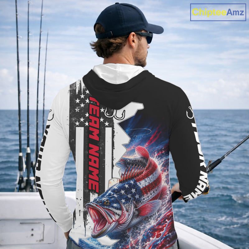 Angler wearing custom American flag bass patriotic black camo long sleeve hooded fishing shirt on the water - back view
