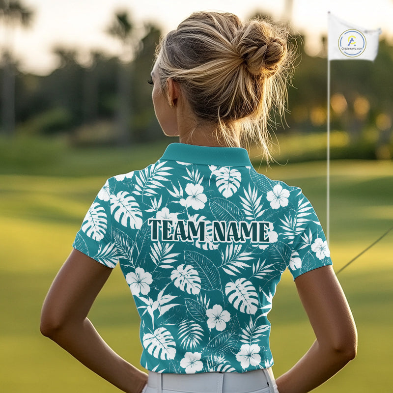 Woman wearing a teal floral patterned golf shirt with 'TEAM NAME' on a golf course