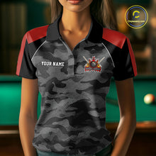 Load image into Gallery viewer, Woman wearing a red camouflage American flag 8 ball billiard jersey beside a pool table front view.