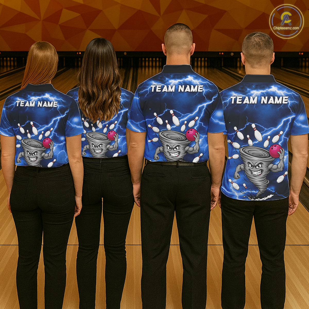 Back view of bowling team wearing matching blue tornado bowling shirts in a bowling alley.
