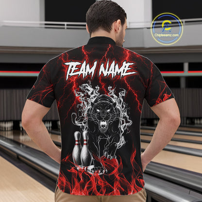 Back view of man wearing a red flaming panther bowling quarter zip shirt in a bowling alley.