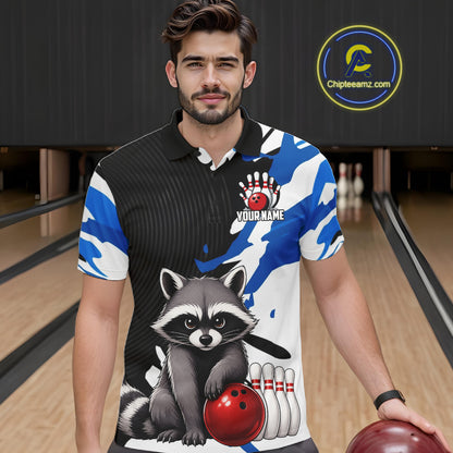 Man wearing a custom bowling shirt with a raccoon design in a bowling alley.