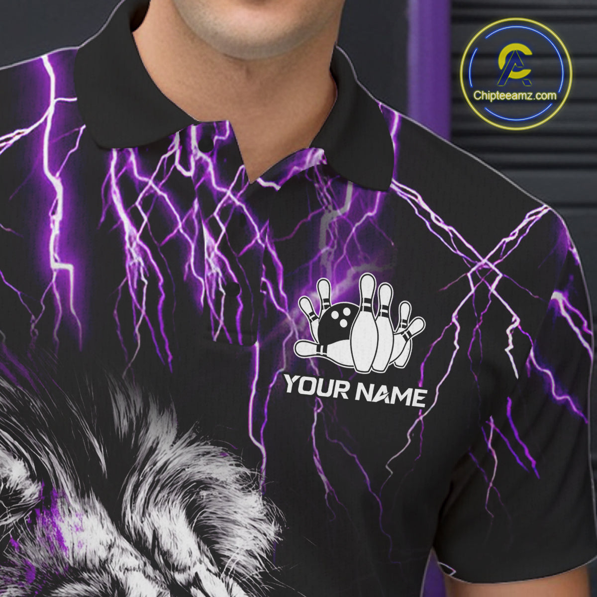 Close up of collar, chest and button details on a black and purple thunder lightning lion men's bowling polo shirt.