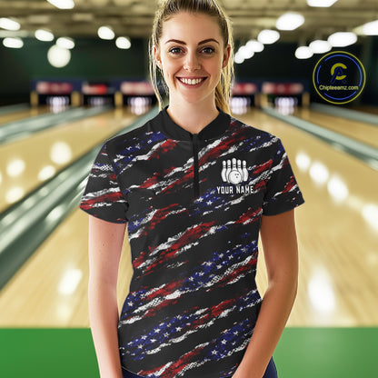 Woman wearing a black American flag quarter zip bowling shirt front view, personalized bowling team apparel.