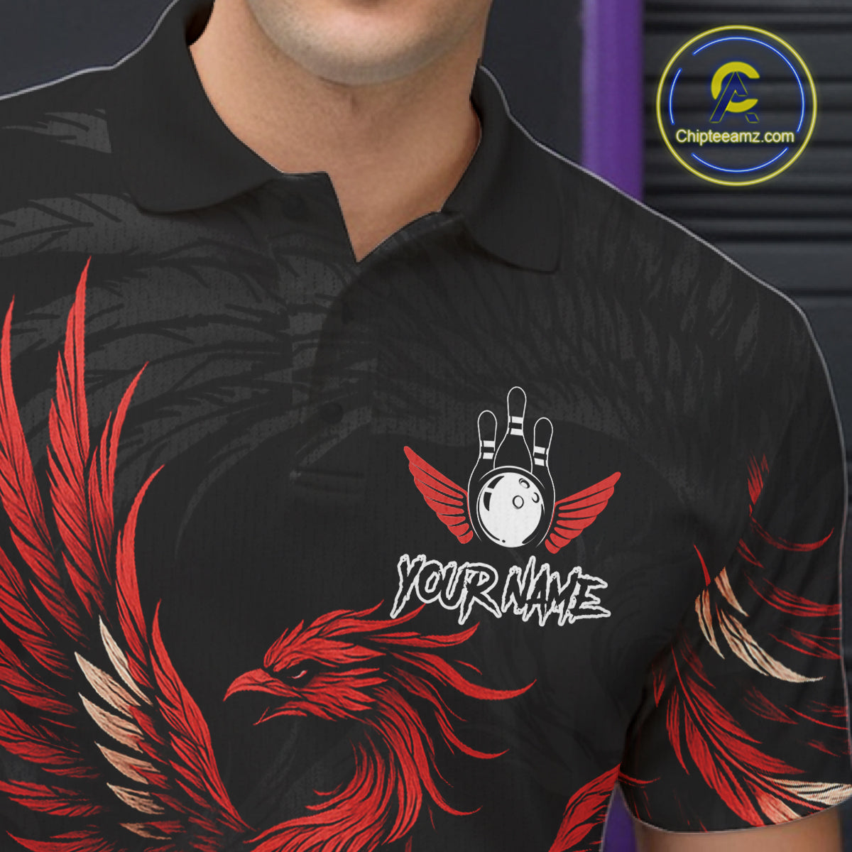 Close up of black and red phoenix wings bowling polo shirt collar, buttons and chest design.