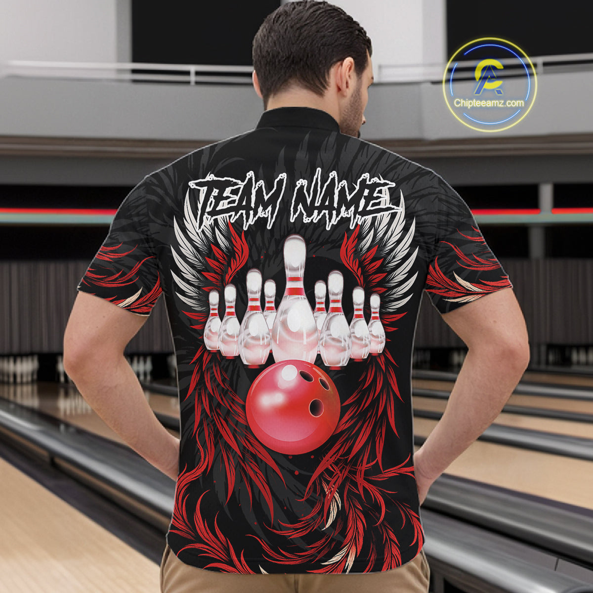 Man wearing black and red phoenix wings bowling quarter zip shirt back view.