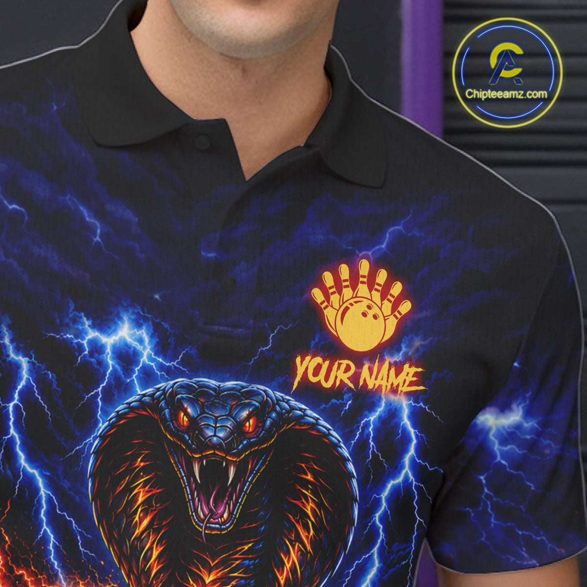 Close up of blue lightning cobra bowling polo shirt collar, buttons and chest design.