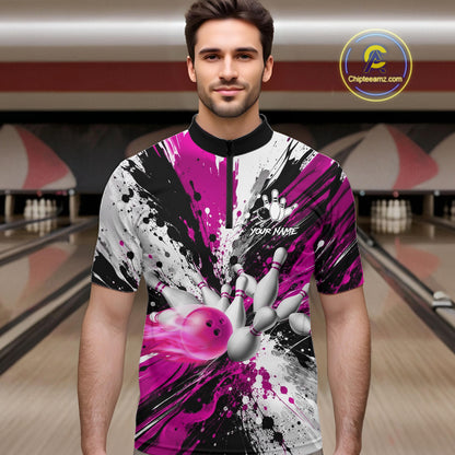 Man wearing a pink splatter bowling quarter zip jersey during league play front view.
