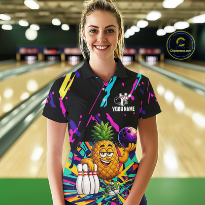 Woman wearing a colorful pineapple bowling quarter zip jersey during league competition front view.