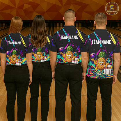 Back view of bowling team wearing matching pineapple bowling shirts in a bowling alley.