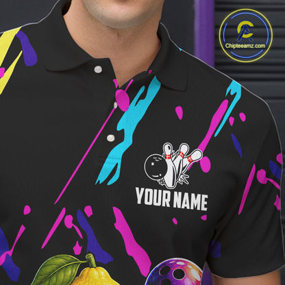 Close-up of a colorful lemon bowling polo shirt collar, buttons, and lemon artwork.