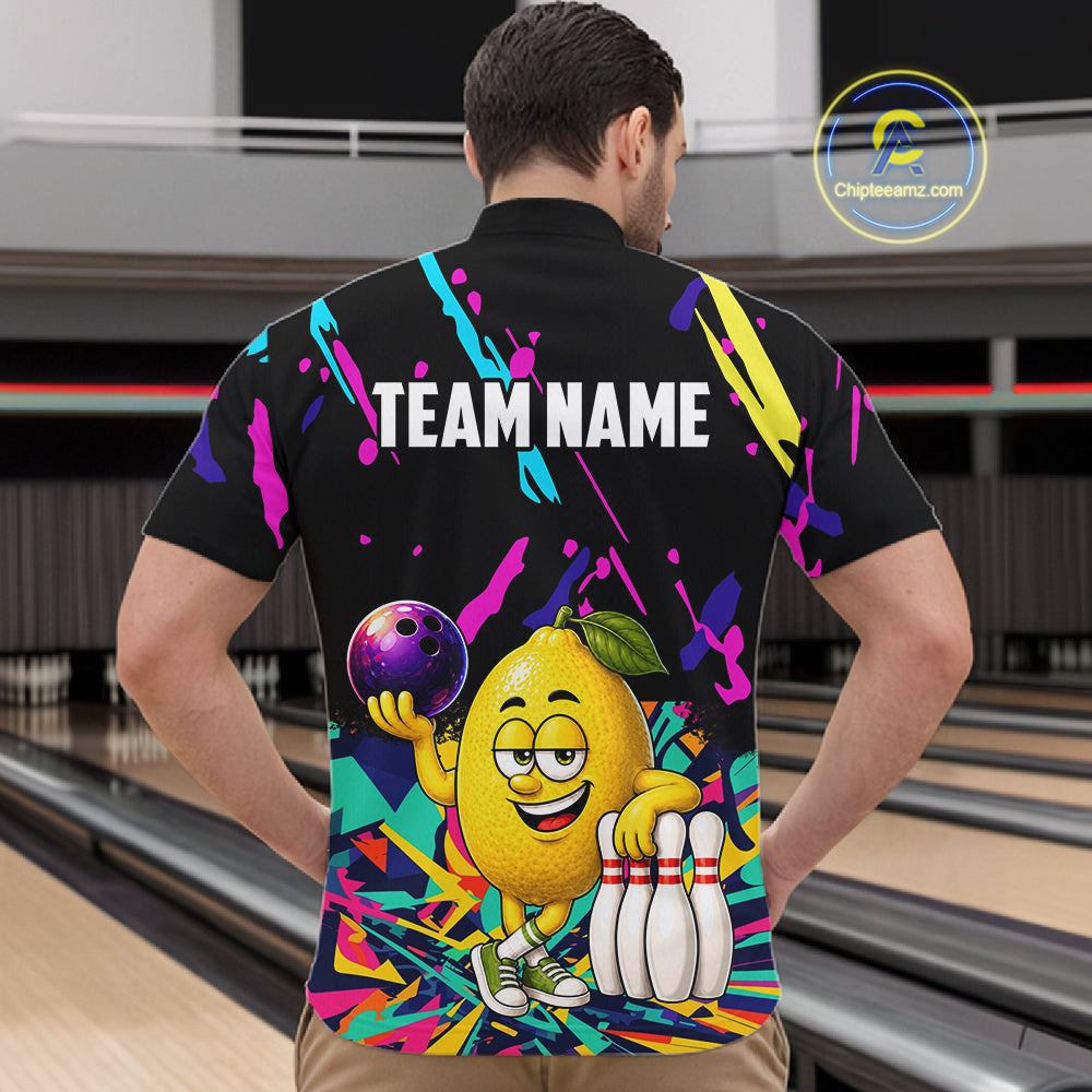 Back view of man wearing a colorful lemon bowling quarter zip shirt in a bowling alley.