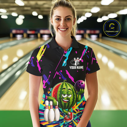Woman wearing a colorful watermelon bowling polo shirt at a bowling alley front view.