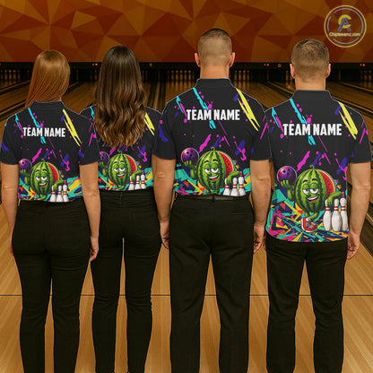 Back view of bowling team wearing matching watermelon bowling shirts in a bowling alley.