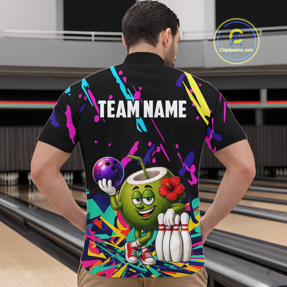 Back view of man wearing a colorful coconut bowling quarter zip shirt in a bowling alley.