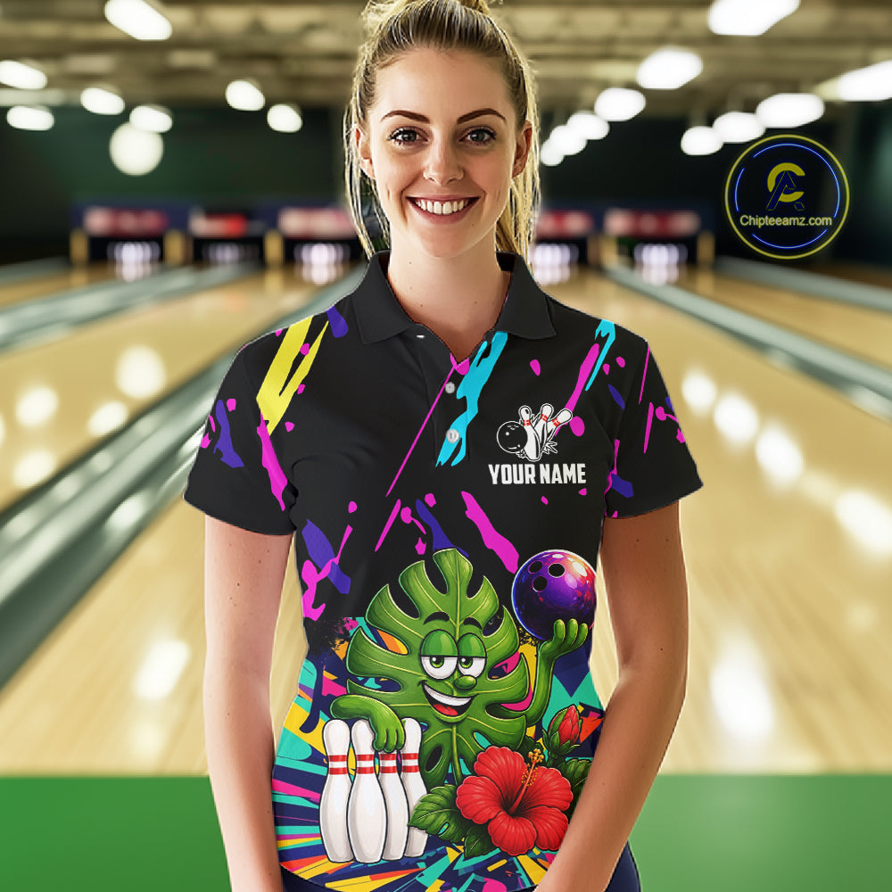 Woman wearing a colorful sunflower bowling polo shirt at a bowling alley front view.