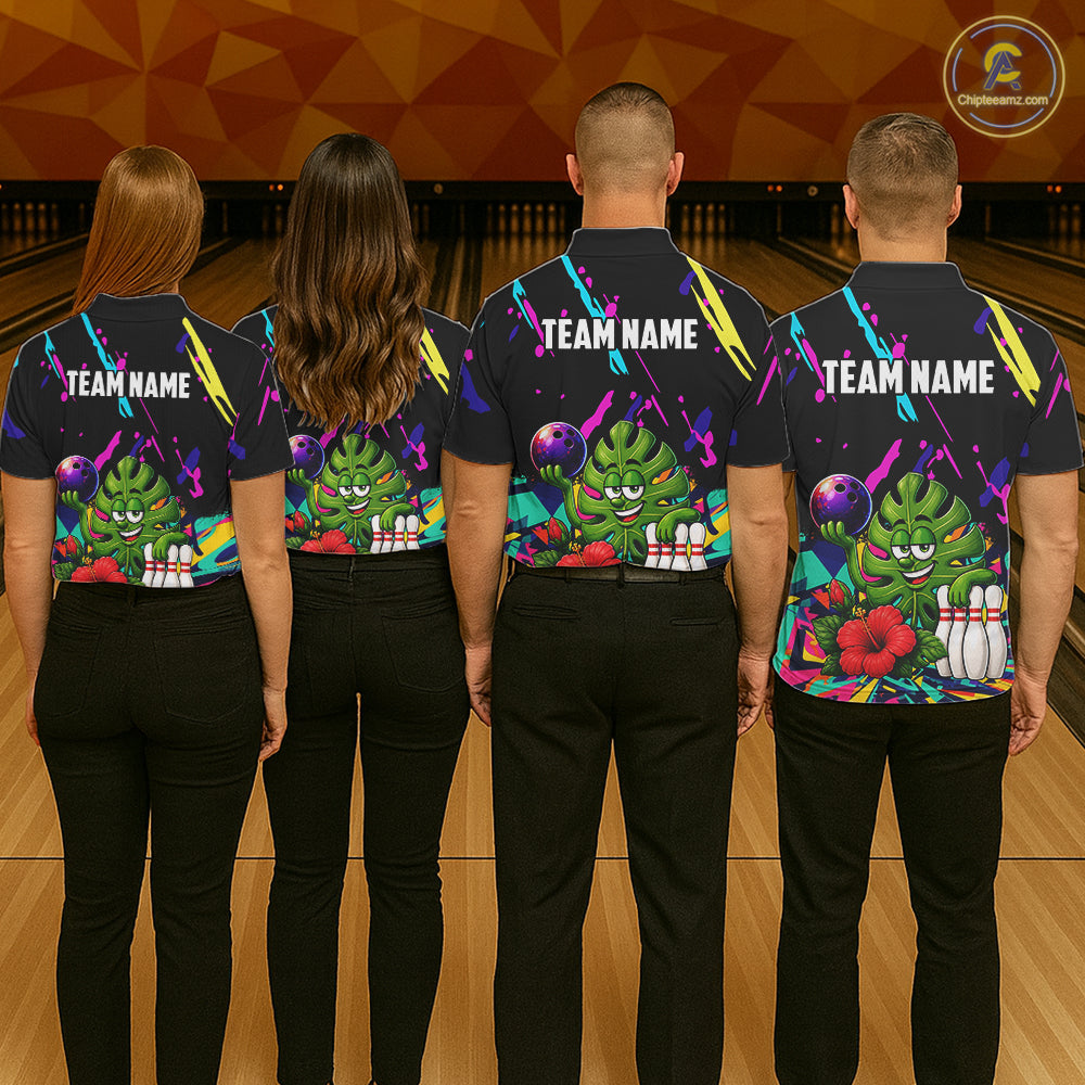 Back view of bowling team wearing matching tropical bowling shirts in a bowling alley.