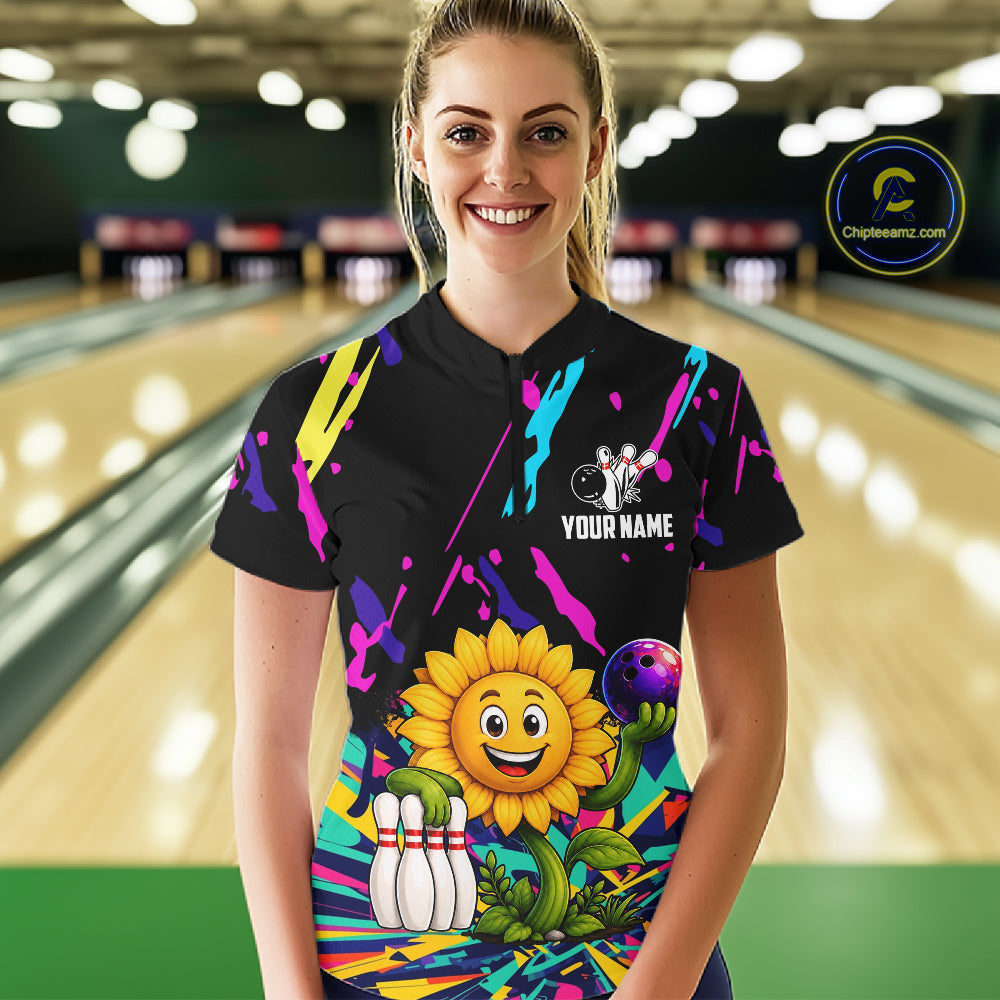 Woman wearing a colorful sunflower bowling quarter zip jersey during league competition front view.