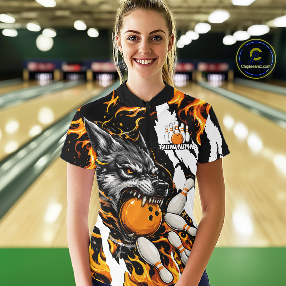 Woman wearing personalized orange flame wolf bowling team jersey polo shirt featuring orange flame wolf artwork, back view.