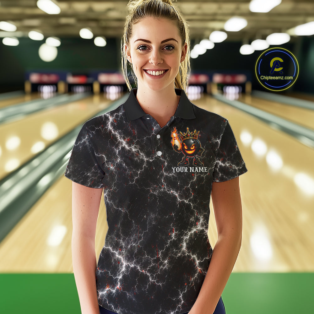 Woman wearing personalized crown bowling ball lightning bowling team jersey polo shirt featuring crown and lightning bowling ball artwork, front view.