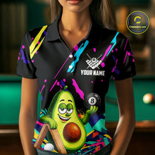 Load image into Gallery viewer, Woman wearing a colorful avocado 8 ball billiard jersey beside a pool table front view.