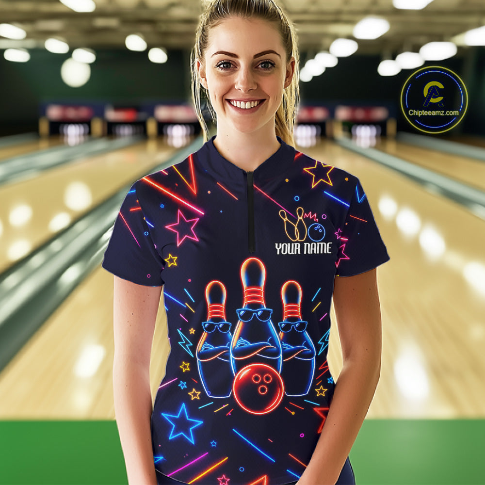 Woman wearing a blue funny neon quarter zip bowling shirt front view.