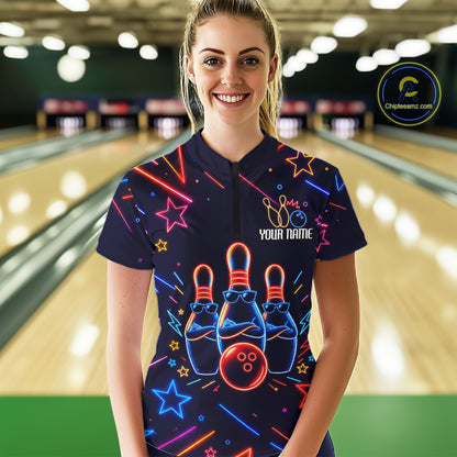 Woman wearing a blue funny neon quarter zip bowling shirt front view.