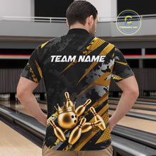 Load image into Gallery viewer, Man wearing a black and gold bowling shirt with 'TEAM NAME' on the back in a bowling alley.