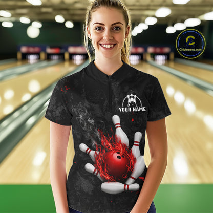 Woman wearing black and red grunge fire bowling quarter zip shirt front view.