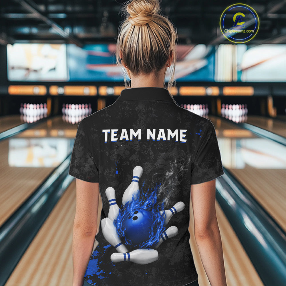 Woman wearing black and blue grunge fire bowling polo shirt back view.