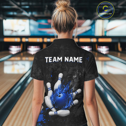 Woman wearing black and blue grunge fire bowling polo shirt back view.