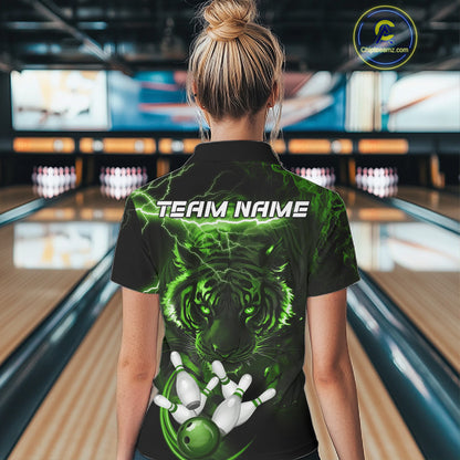 Woman wearing green thunder lightning tiger bowling polo shirt back view.