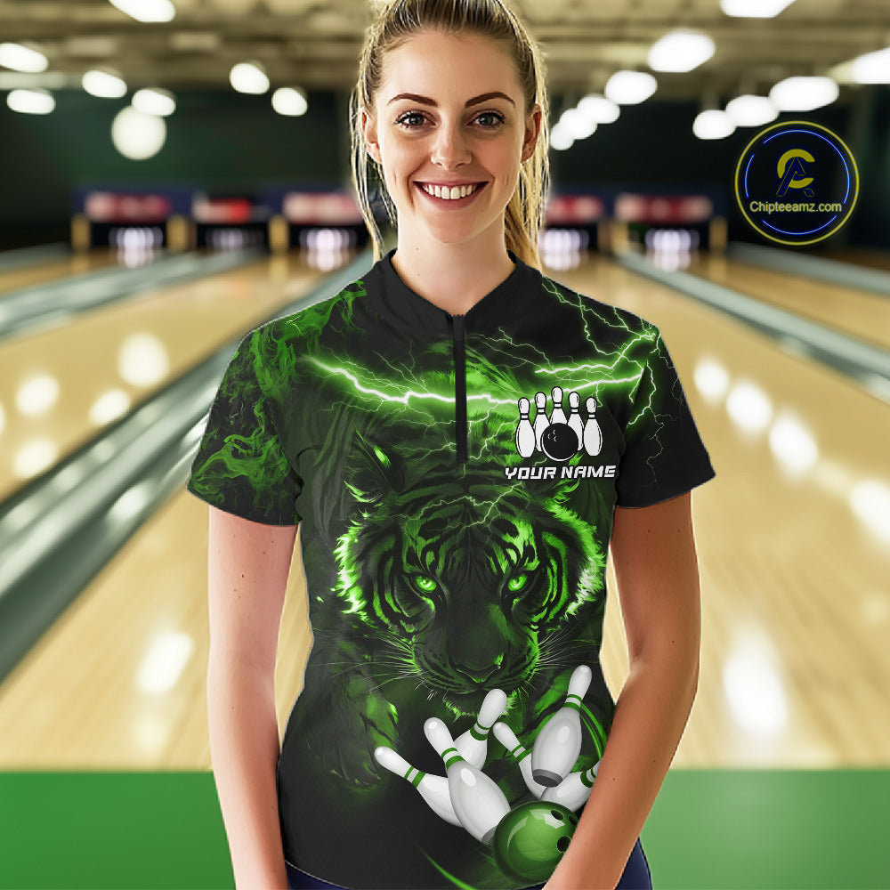 Woman wearing green thunder lightning tiger bowling quarter zip shirt front view.