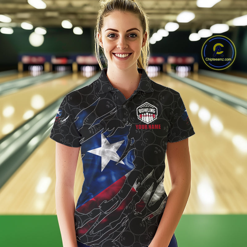 Woman wearing a smoke Texas flag black bowling polo shirt at a bowling alley front view.