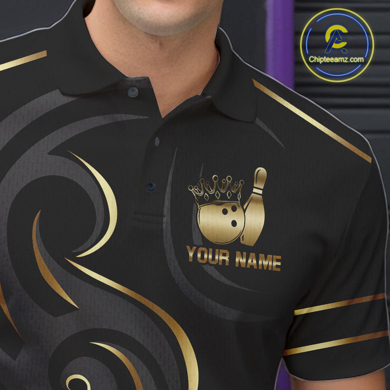 Close-up of a black and gold crown bowling ball polo shirt collar, buttons, and crown artwork.
