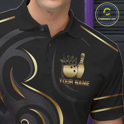 Close-up of a black and gold crown bowling ball polo shirt collar, buttons, and crown artwork.
