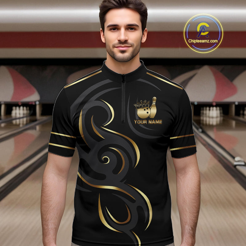 Man wearing a black and gold crown bowling ball quarter zip jersey during league competition front view.