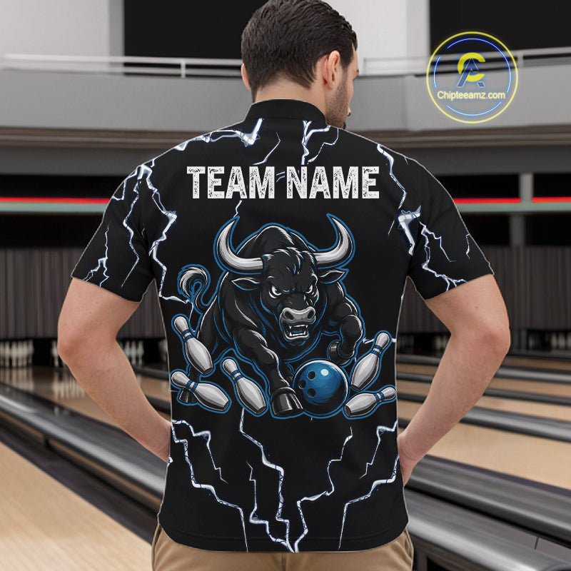 Back view of man wearing a blue bull lightning bowling quarter zip shirt in a bowling alley.