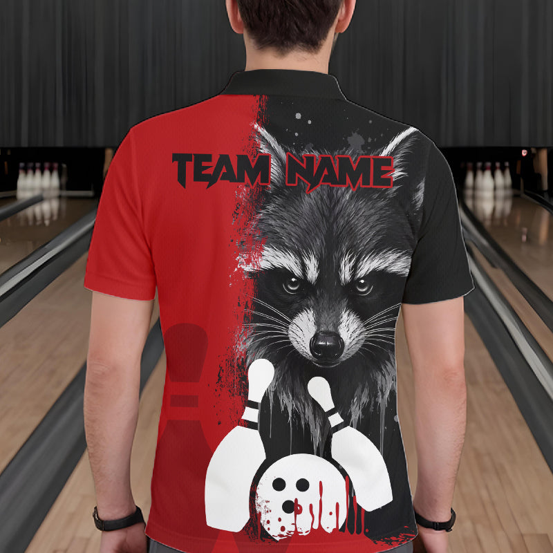 Back view of man wearing a black and red raccoon bowling polo shirt inside a bowling alley.