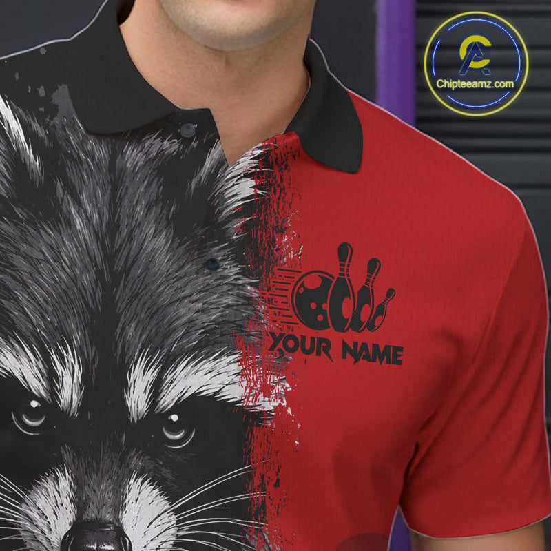 Close-up of a black and red raccoon bowling polo shirt collar, buttons, and raccoon artwork details.
