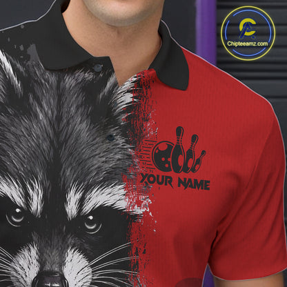 Close-up of a black and red raccoon bowling polo shirt collar, buttons, and raccoon artwork details.