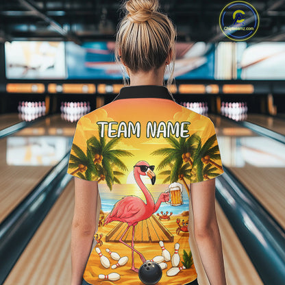 Back view of woman wearing a funny flamingo sunset tropical bowling polo shirt inside a bowling alley.