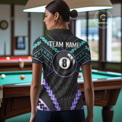 Woman wearing a teal and purple 8 ball tribal billiard jersey beside a pool table front view.